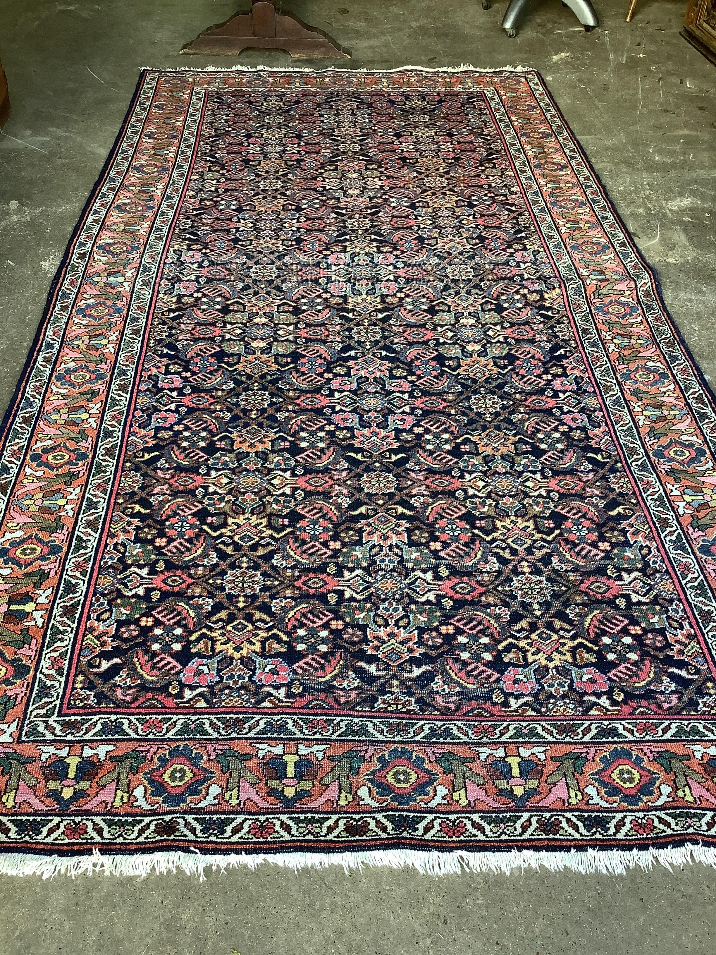 A North West Persian Mahal blue ground corridor carpet, last quarter of the 19th century, 315 x 158cm